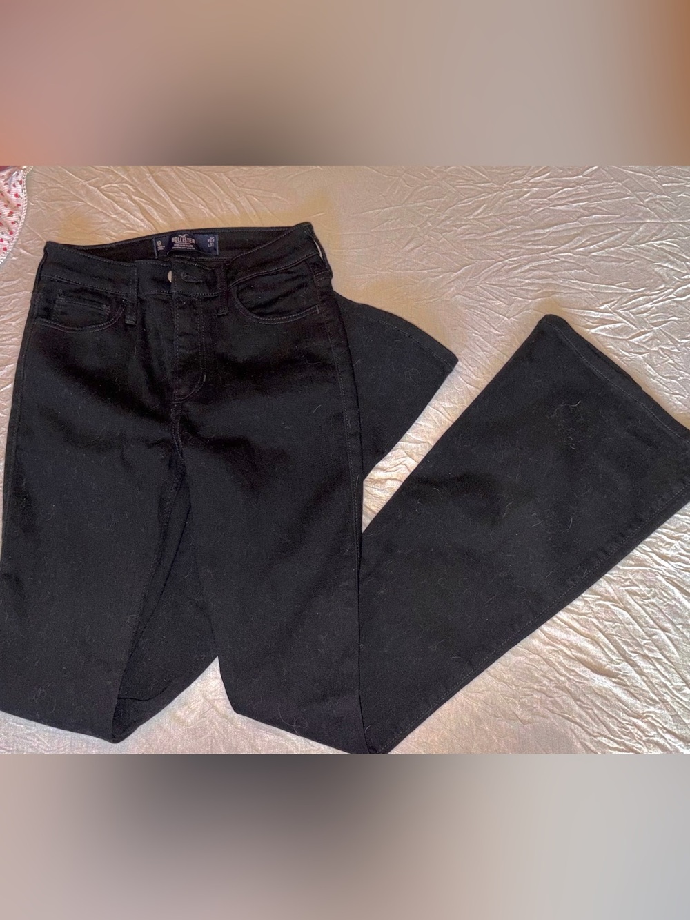 Black Hollister flair jeans with slit in bottom